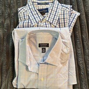 2 long sleeve men’s dress shirts, size 16” neck and 32-33 shirt size. EUC